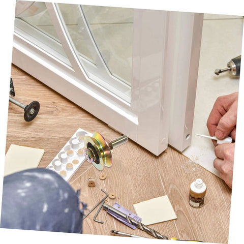Installing heavy duty sliding door rollers with U shaped track for smooth motion on a sliding door.