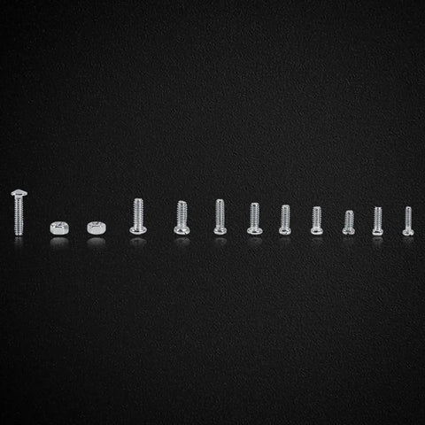 600 Piece Small Screws And Nuts Kit With 12 Types Stainless Steel Micro Fasteners in a row on a black background.