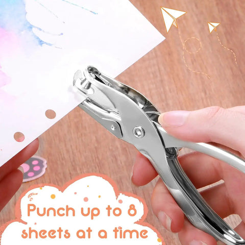 Using the 24 Pack 1/4 Inch Single Hole Punch Set Metal Paper Puncher with a silver finish on paper, showing hole punch in action.