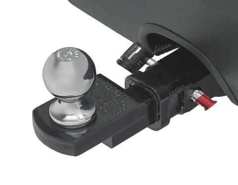 Silver And Red Receiver Lock For Five Eighth Inch Hitch Pins With A Three And A Half Inch Shaft Push To Lock Security Stainless Steel Barbell Hitch Pin Lock Weather Resistant Tow Package Lock For Late Model Trucks Heavy Duty in use on a vehicle hitch.