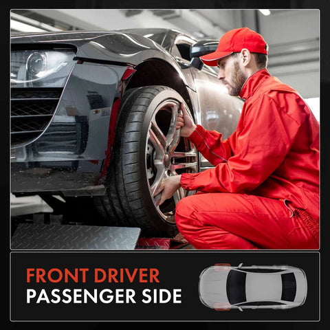 Mechanic working on front driver passenger side wheel of a black car on a lift in a garage.