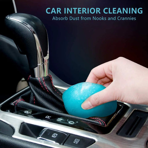 Cleaning Gel For Car Detailing Putty For Vents And Interior Dust Removal Gentle Auto Interior Cleaner Dust Slime For Cars Keyboard Gel Cleaning Putty 1 Pack, blue gel being used in a car gear shift area.