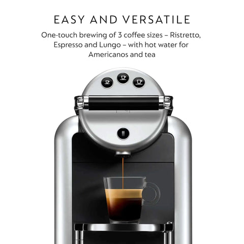Front view of Zenius Professional Coffee Machine brewing espresso, featuring three cup size buttons on the top.