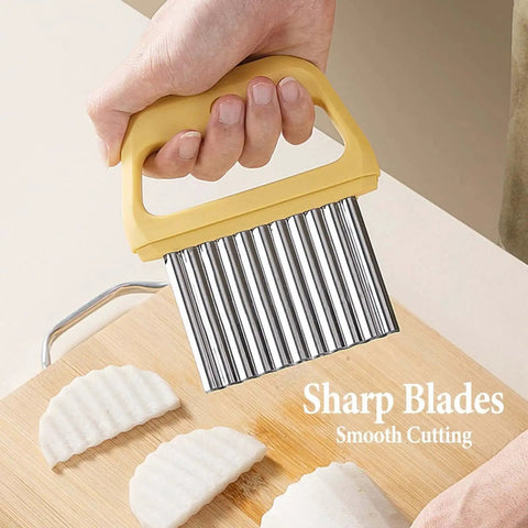 Person using Crinkle French Fry Cutter Wave Slicer For Potatoes Portable Stainless Steel Cutter With Large Wide Blade And Blade Cover Ideal For On The Go Travel Friendly Makes Waffle Fries Quickly At Home on wooden board.