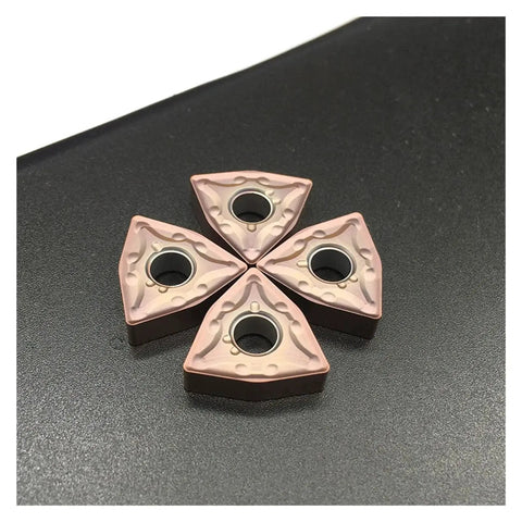 10 Piece Set WNMG080408 MA 15TF Carbide Turning Inserts For Hard Steel CNC Lathe External Turning Tools Delivers Beefy Tool Life Fast Cutting Low Friction Wear And Heat Resistance With A Multi Layer Coating arranged on a surface.