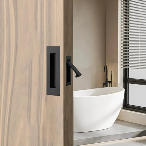 Side view of pocket door with matte black flush handles, showing modern design for sliding doors, includes two 6x2 inch pulls, 3.15x0.87 inch edge pull.