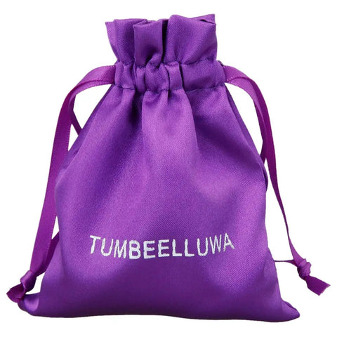 Purple satin drawstring pouch with 'TUMBEELLUWA' embroidery