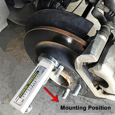 Adjustable Magnetic Camber Gauge Tool For Vehicle Suspension And Wheel Alignment mounted on brake disc.