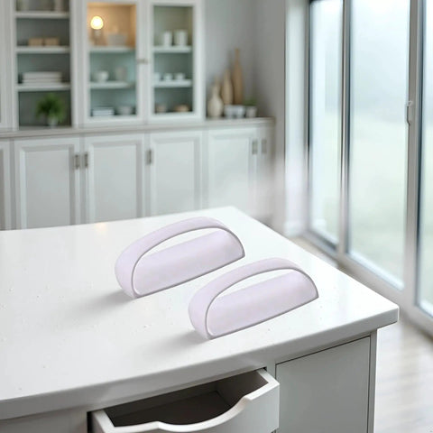 Two Pack White Adhesive Handles Self Stick Wardrobe And Cabinet Pulls on white table in modern kitchen