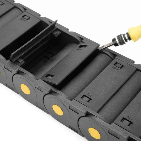 R55 25mm By 77mm Plastic Cable Drag Chain with open cover, showing internal structure for robotics CNC use, screwdriver adjusting