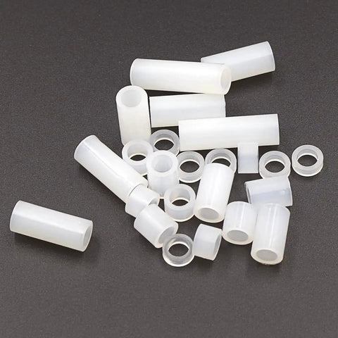 White Nylon Unthreaded Clearance Spacers And Standoffs Kit With 6.3mm Outer Diameter And 4.2mm Inner Diameter, various lengths visible.