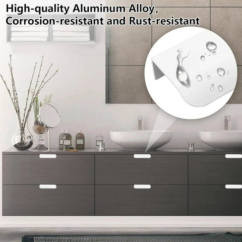 Installed view of Eight Pack Finger Edge Self Stick Cabinet Drawer Pulls 80mm White Concealed Handles on bathroom drawers.