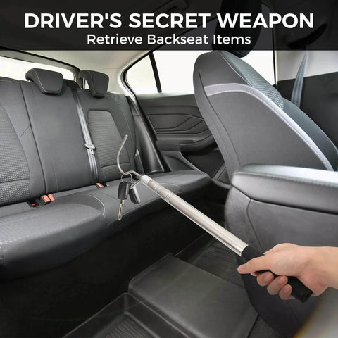 Using Bed Buddy Truck Tool Adjustable 16 To 37 Inch Cargo Grabber to retrieve items from a car backseat, showcasing sturdy steel hook.