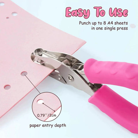 Sweet Two Size Hole Punch Set With Soft Grip Handle punching pink paper showing 1/4 inch and 1/8 inch holes and scrap container