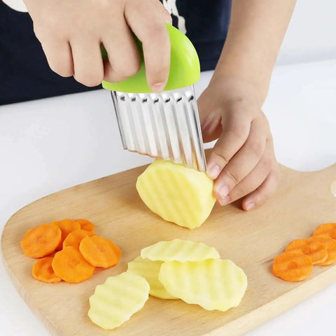 Person using 2 Pack Crinkle Cutter Wavy Chopper Stainless Steel Kitchen Slicer For Potatoes Carrots Fries Chips Vegetables Durable Rust Resistant Blade With Ergonomic Soft Grip Handle And Easy Cleanup