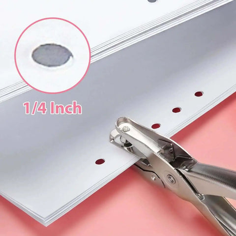 One Quarter Inch Single Hole Punch With Soft Grip Handles punching paper, showing 1/4 inch hole size, 6 sheet capacity, close-up view.