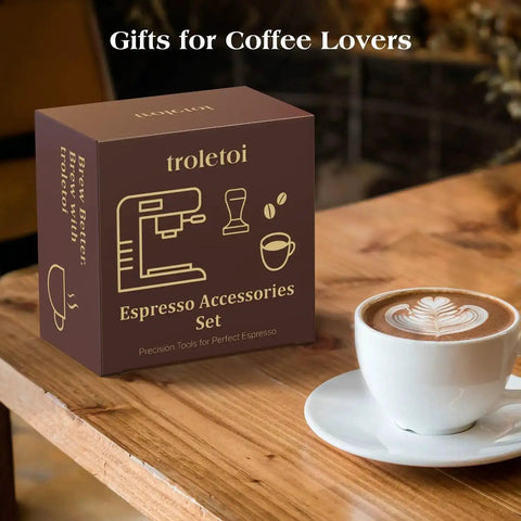 7 Piece Espresso Tools Kit For 54mm Breville Portafilters Includes 53.3mm Tamper Distributor Puck Screen Dosing Funnel WDT Tool Perfect Home Barista Gear displayed in box on table next to latte.
