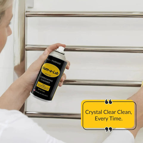 Person using Go To All Purpose Metal Lubricant And Cleaner Spray For Rust Prevention Polishing And Protection Penetrating Oil Silicone Spray Garage Door Ready Multi Purpose Metal Cleaner on metal towel rack