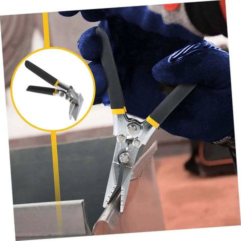 Close-up of Manual Metal Bender Pliers With Serrated Jaws Hand Seamer Tool using serrated jaws on metal edge in workshop