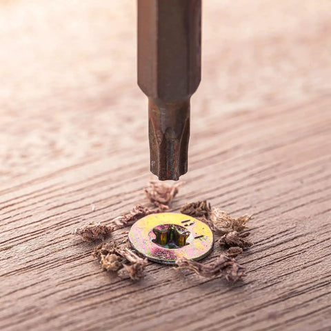 M4-0.7x10mm Flat Head Torx Anti Theft Machine Screw being installed in wood, showing full thread and countersunk design