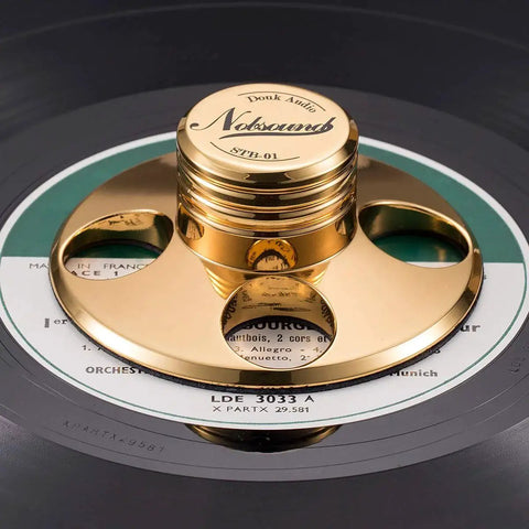 Gold finish LP Vinyl Turntable Stabilizer Disc Weight reducing resonance and noise on record, improving image and focus.