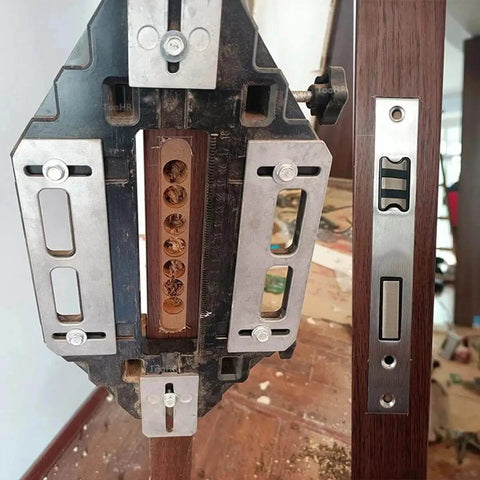 Close-up of DIY Ready Door Hinge Jig For Woodworking With Aluminum Slotting Locator And Hole Locator on wood door.