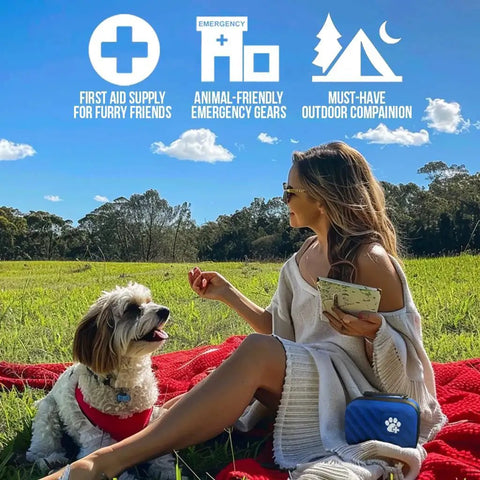Woman with dog using Pet Medic First Aid Kit With 95 Piece Vet Approved Medical Supplies For Dogs And Cats outdoors in a field.