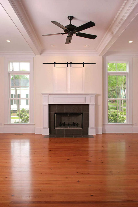 6 Ft Mini Cabinet Barn Door Hardware Kit Sliding Double Door DIY Friendly Finish In Oil Rubbed Bronze installed over fireplace