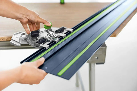 Close-up of 100 Year Limited Edition Guide Rail 55 Inch Track Saw Rail For TSC 55 TS 55 TS 75 being aligned on a workbench.
