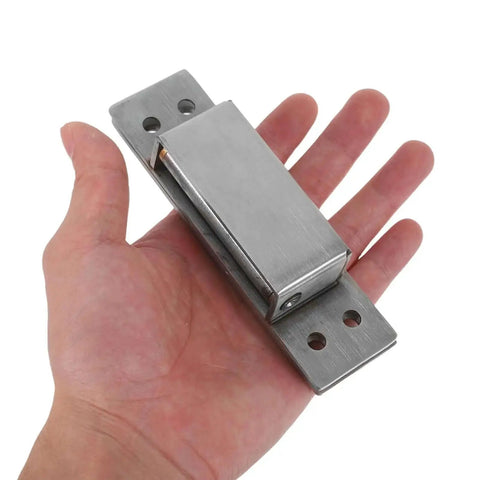 Hand holding a Concealed Adjustable 5 Inch Silver Door Hinge For Wooden Cabinets And Secret Bookcases, heavy duty invisible hinge