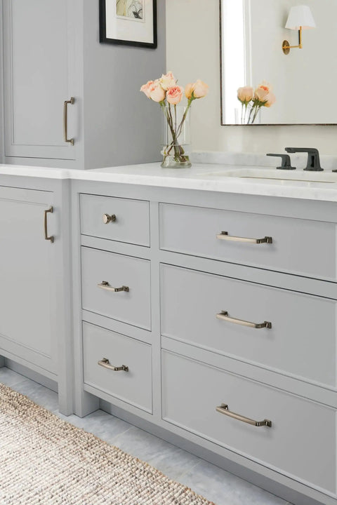 Westerly Graphite Cabinet Pull 6-5/16 Inch Center-To-Center, 7-9/16 Inch Overall Length, installed on grey kitchen cabinets
