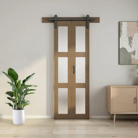 Bifold Glass Barn Door Kit 36 Inch with Hardware included, three-panel glass slab, installed in modern living room setting.