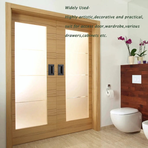 2 Pack Zinc Alloy Recessed Pull Handles For Cabinets And Containers, Black Finish on wooden sliding doors in a modern bathroom setting.