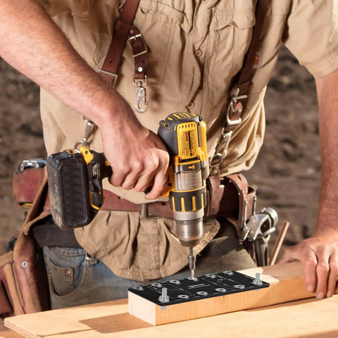 Carpenter using Aluminum Shelf Pin Drilling Jig For One Quarter Inch And Five Millimeter Holes on wooden board