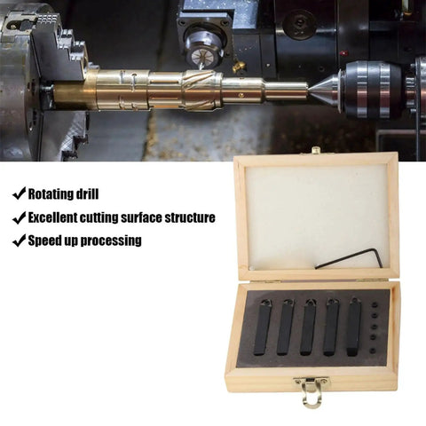 Carbide Turning Tool Indexable Set 5 Pieces 5 Sixteenth Inch Cutting Tools For Surface Finishing Boring Chamfering Lathe Work 60 Degree 75 Degree 90 Degree Tools With Hardwood Storage Box displayed next to a lathe machine.