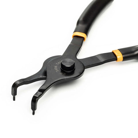 Close-up of 12 Piece Snap Ring Pliers Set With Straight, 45 Degree And 90 Degree Jaws For Deep Access, focused on the fixed tip