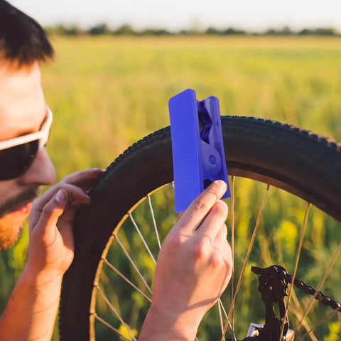 TEHAUX bike hydraulic brake hose cutter tool, blue plastic, used to cut a brake hose on a bicycle