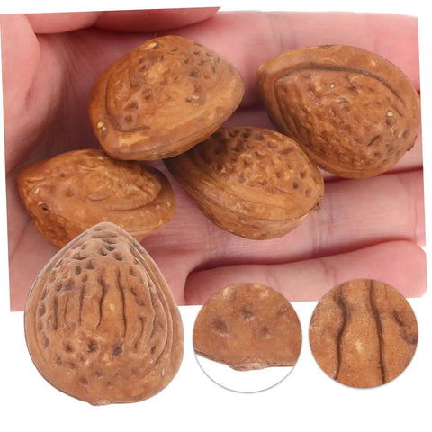 40 Realistic Faux Almonds For Crafts And Food Photography in hand, lifelike artificial nuts for home decor and miniature displays