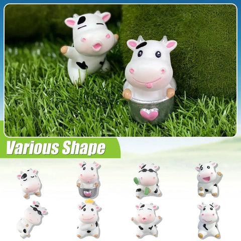 8 Pcs Cute Cow Car Dashboard Ornaments Set For Interior Decor displayed on grass, showcasing various playful resin cow designs.