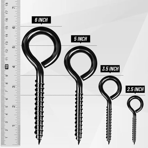 Four black screw eye hooks of varying sizes with a ruler for scale, featuring the Built Tough 5 Inch Eye Hooks Set Of 4 Screws In Carbon Steel Black.