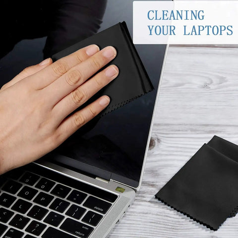 Person cleaning laptop screen with microfiber cloth from Microfiber Cleaning Cloths For Glasses And Screens 50 Pack 6x7 Inches