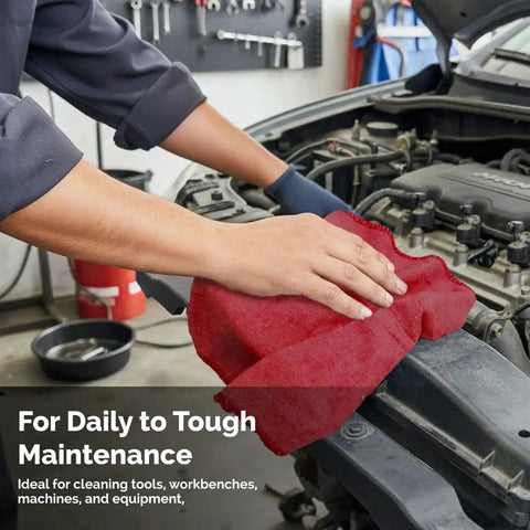 Hand using Heavy Duty Cotton Shop Towels Red Pack Of 150 Absorbent Cleaning Rags For Auto Garage And Home Multipurpose Towels