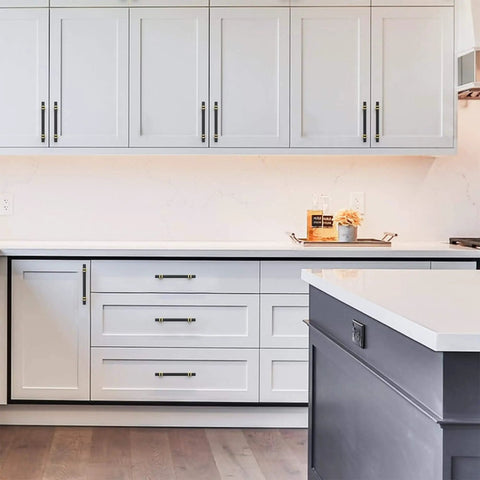 Modern kitchen with Matte Black and Gold Cabinet Pulls for Kitchen and Bathroom, 5 Inch Center to Center 128mm, 10 Pack on drawers