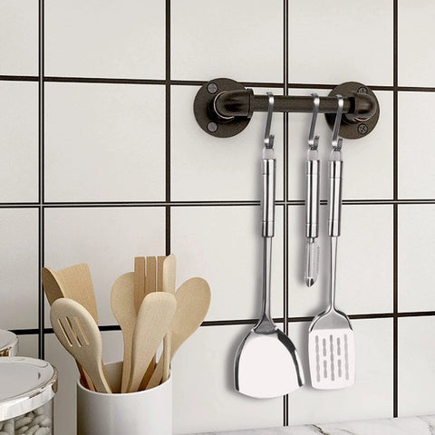 9.6 Inch Pipe Barn Door Pull Handle in Black Rustic Industrial Finish used as utensil hanger on tiled wall