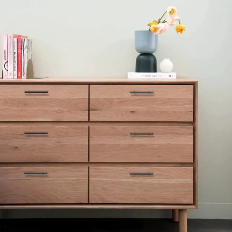 Dresser with 10 Pack Matte Black Cabinet Handles 4 Inch Center To Center, 6-3/8 Inch Overall Length, installed on drawers.