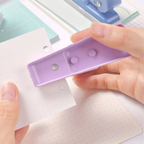 Using Pro Grade 40 Sheet Single Hole Punch With Non Slip Base 5.5mm Hole Adjustable Punch Position in scrapbooking