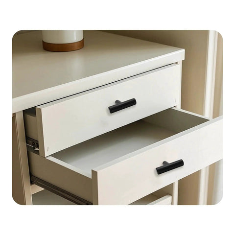 Six Pack 2 Inch T Bar Cabinet Knobs In Brushed Nickel Finish on white dresser drawer