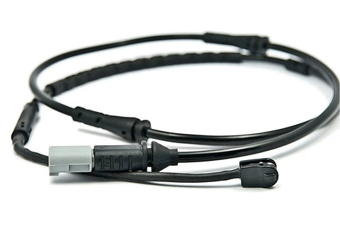BMW front brake pad wear sensor cable with gray connector and black sensor housing, close-up view