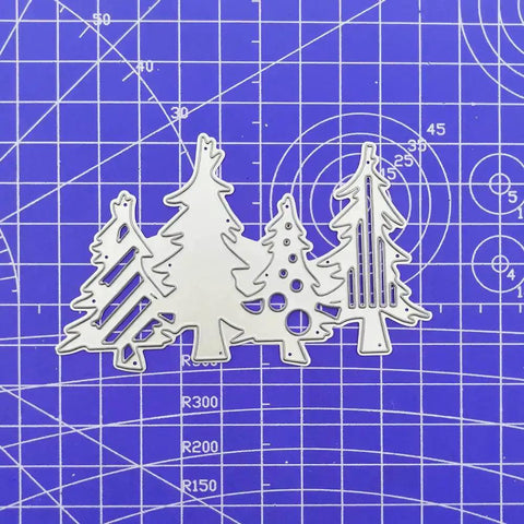 Christmas Tree Die Set For Card Making And Scrapbooking on blue cutting mat