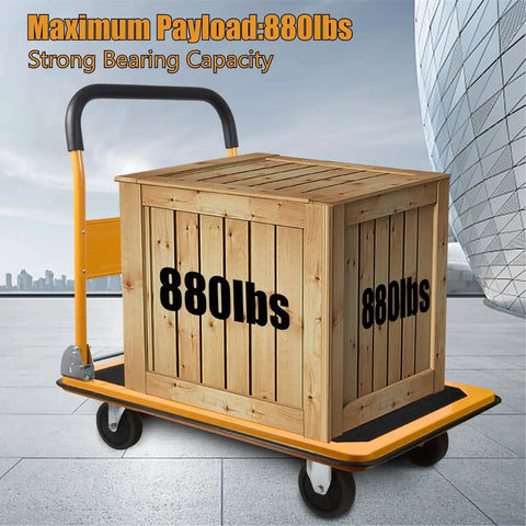 Yellow heavy duty foldable platform truck with 880 lb capacity, shown carrying a wooden crate, for moving large loads.